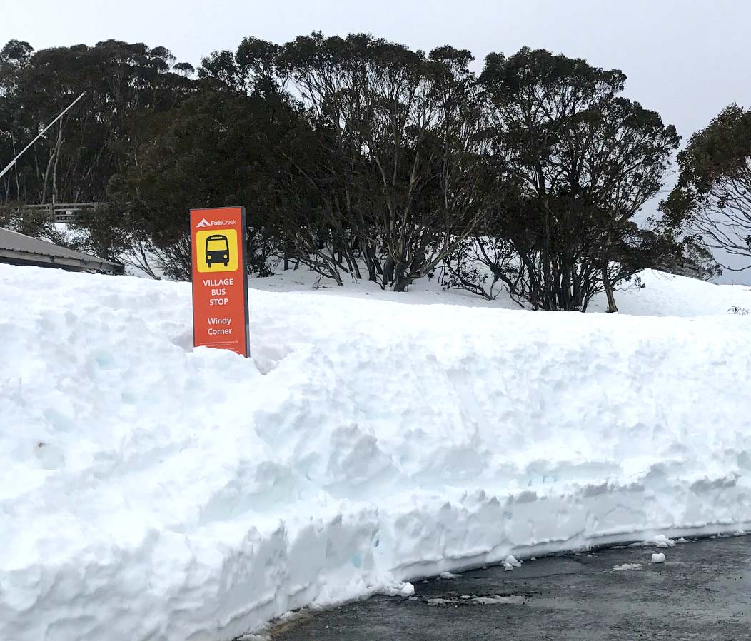 visitor orientation signage at Falls Creek in heavy winter snow